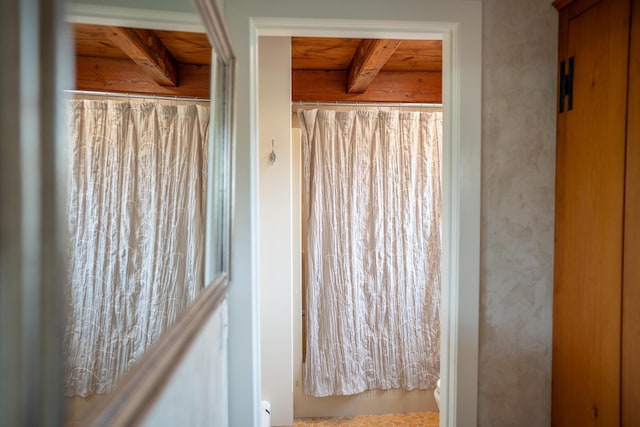 625 Bridge Rd, Eastham, MA 02642 - bathroom with beamed ceiling, curtained shower, and a bath