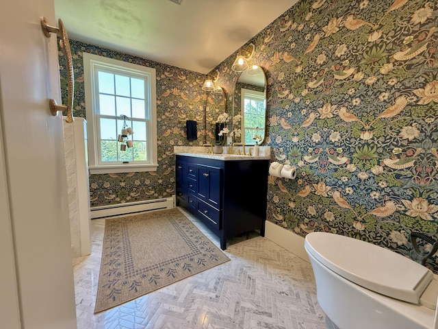 625 Bridge Rd, Eastham, MA 02642 - bathroom with wallpapered walls, a baseboard radiator, and vanity