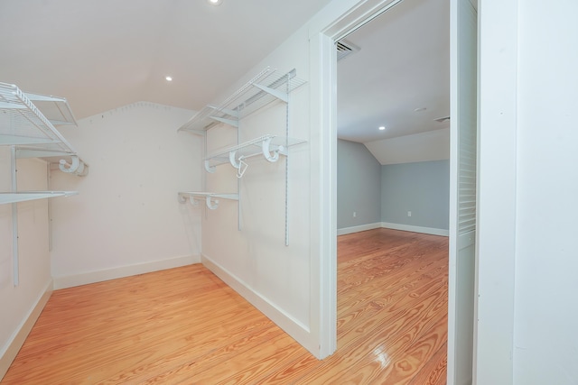 240 Oak St, Centerville, MA 02632 - spacious closet with lofted ceiling and wood finished floors