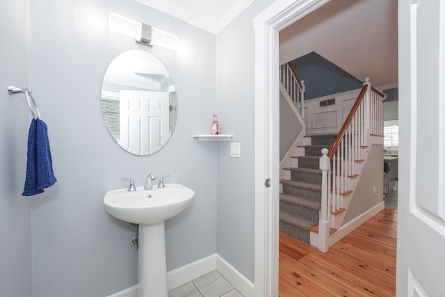 240 Oak St, Centerville, MA 02632 - bathroom with baseboards and wood finished floors