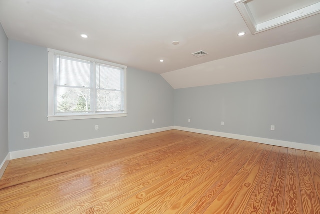 240 Oak St, Centerville, MA 02632 - bonus room with vaulted ceiling, light wood-style floors, recessed lighting, and baseboards