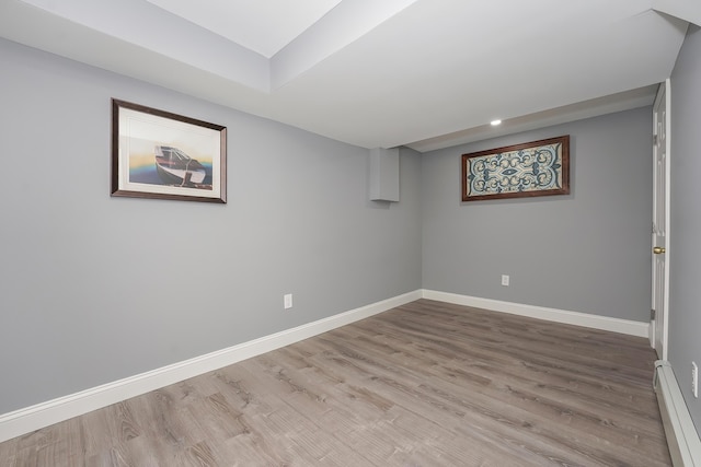 240 Oak St, Centerville, MA 02632 - finished basement featuring a baseboard heating unit, baseboards, wood finished floors, and recessed lighting