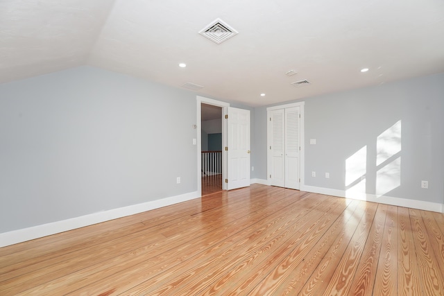 240 Oak St, Centerville, MA 02632 - unfurnished bedroom featuring light wood finished floors, baseboards, recessed lighting, and a closet