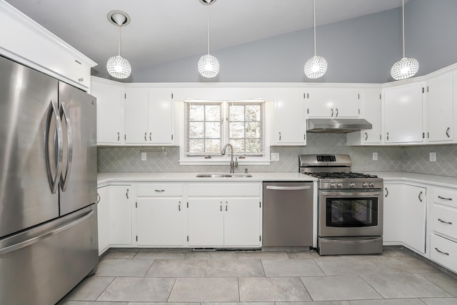 240 Oak St, Centerville, MA 02632 - kitchen featuring stainless steel appliances, under cabinet range hood, a sink, light countertops, and high vaulted ceiling