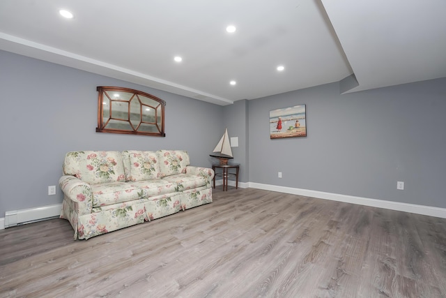 240 Oak St, Centerville, MA 02632 - living room with wood finished floors, recessed lighting, a baseboard heating unit, and baseboards