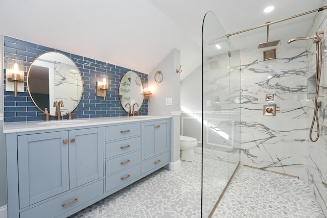 240 Oak St, Centerville, MA 02632 - full bathroom with double vanity, toilet, a marble finish shower, vaulted ceiling, and recessed lighting