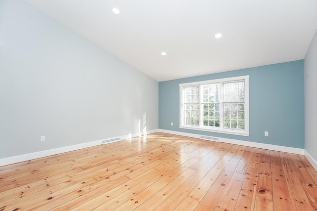 240 Oak St, Centerville, MA 02632 - empty room with hardwood / wood-style flooring, baseboards, and recessed lighting