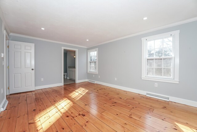 240 Oak St, Centerville, MA 02632 - unfurnished bedroom featuring light wood-type flooring, baseboards, crown molding, recessed lighting, and connected bathroom