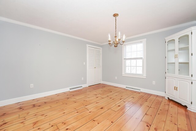 240 Oak St, Centerville, MA 02632 - spare room with a chandelier, crown molding, light wood-style floors, and baseboards