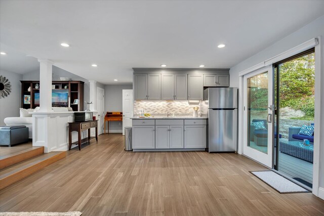 118 Driftwood Ln, South Yarmouth, MA 02664 - kitchen featuring freestanding refrigerator, gray cabinets, decorative backsplash, light wood-style floors, and recessed lighting