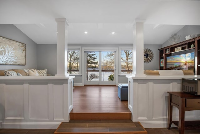 118 Driftwood Ln, South Yarmouth, MA 02664 - kitchen with ornate columns, light countertops, white cabinets, recessed lighting, and baseboards