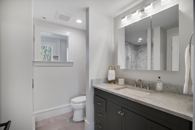 118 Driftwood Ln, South Yarmouth, MA 02664 - bathroom featuring toilet, vanity, walk in shower, baseboards, and recessed lighting