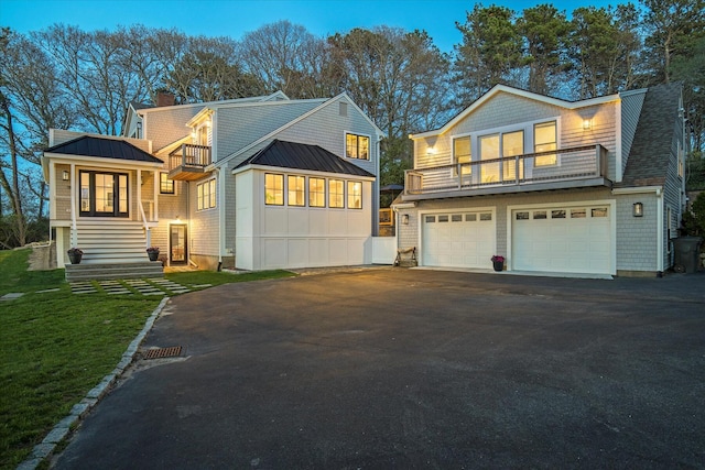 118 Driftwood Ln, South Yarmouth, MA 02664 - shingle-style home featuring a balcony, driveway, a standing seam roof, and a garage