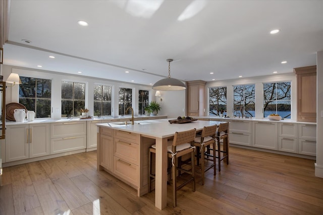 118 Driftwood Ln, South Yarmouth, MA 02664 - kitchen with a sink, healthy amount of natural light, light countertops, a kitchen island with sink, and recessed lighting