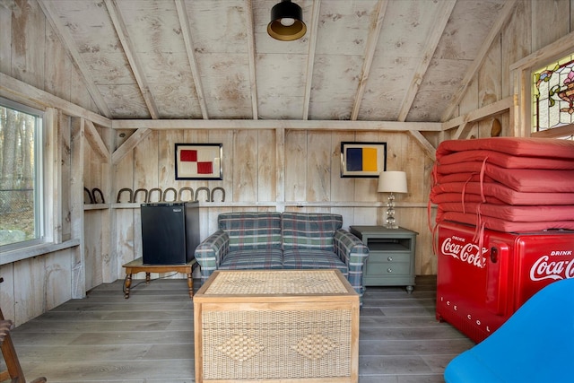 118 Driftwood Ln, South Yarmouth, MA 02664 - living area featuring lofted ceiling, hardwood / wood-style floors, and wood walls