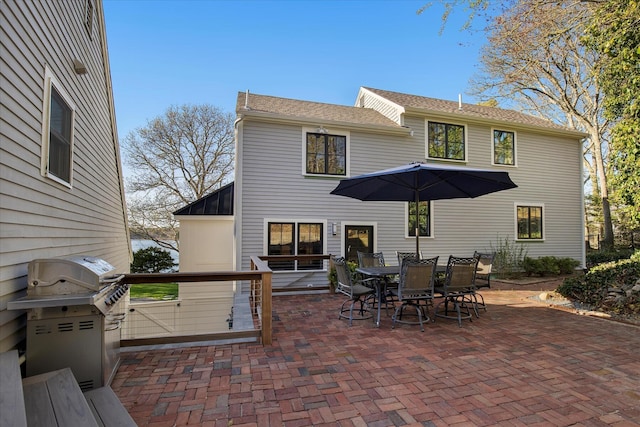 118 Driftwood Ln, South Yarmouth, MA 02664 - rear view of property with a patio area