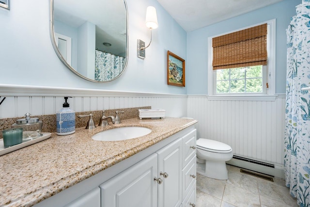 44 Leeward Run, South Yarmouth, MA 02664 - full bathroom with wainscoting, vanity, tile patterned flooring, a baseboard heating unit, and a shower with curtain