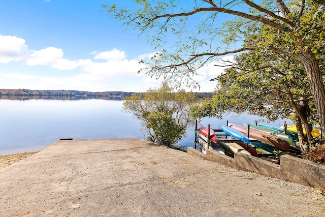 dock area with a water view