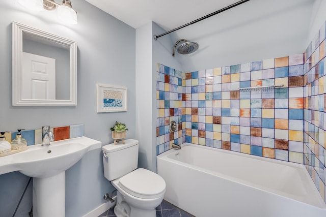 full bath featuring toilet, shower / bath combination, tile patterned flooring, and baseboards