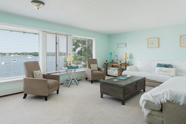 carpeted living room featuring a baseboard radiator