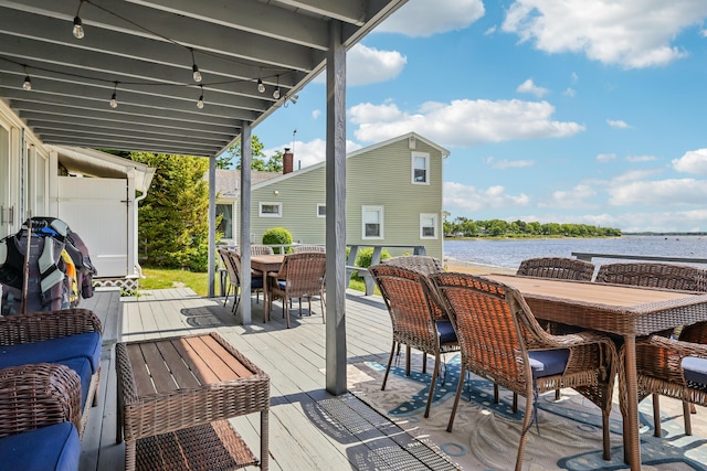 57 Oak St, Wareham, MA 02571 - wooden deck featuring outdoor dining area and a water view