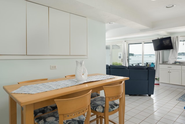 57 Oak St, Wareham, MA 02571 - dining area with light tile patterned flooring and recessed lighting