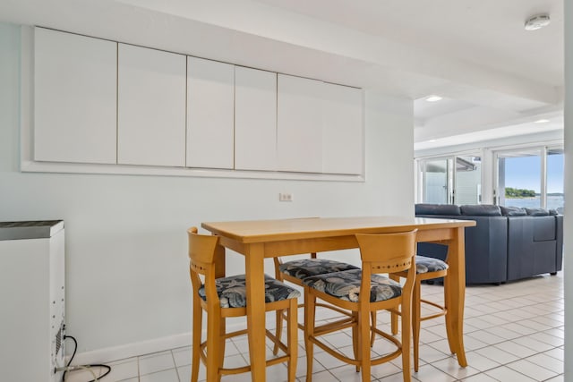 57 Oak St, Wareham, MA 02571 - dining space featuring light tile patterned floors, baseboards, and recessed lighting