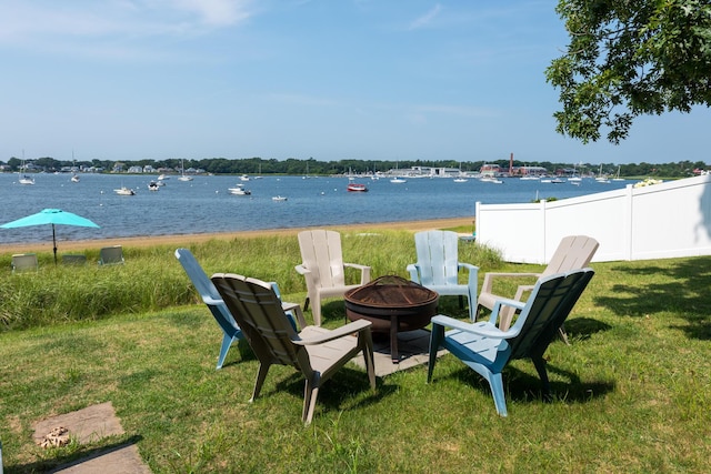 water view with a fire pit