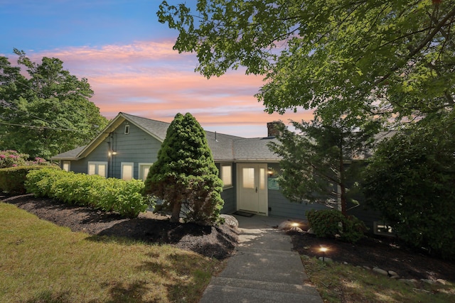 57 Oak St, Wareham, MA 02571 - view of front facade featuring a shingled roof and a chimney