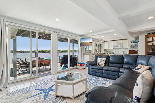 57 Oak St, Wareham, MA 02571 - living room featuring a water view, light tile patterned floors, recessed lighting, and beamed ceiling