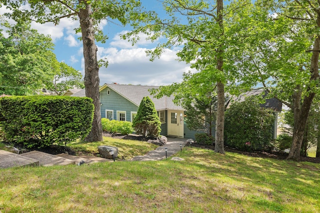 57 Oak St, Wareham, MA 02571 - view of front of home with a front lawn and roof with shingles