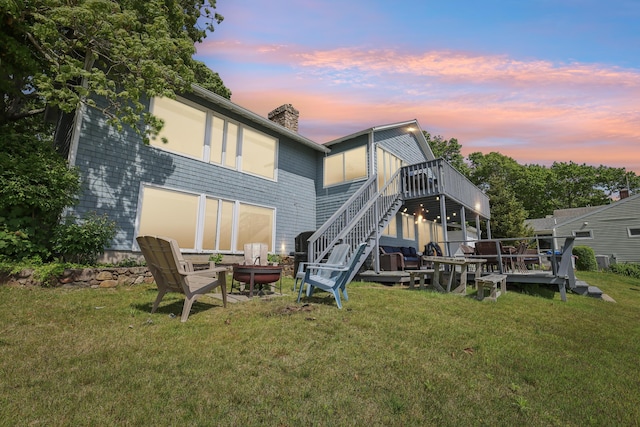 57 Oak St, Wareham, MA 02571 - rear view of house with a deck, a chimney, a yard, and stairs