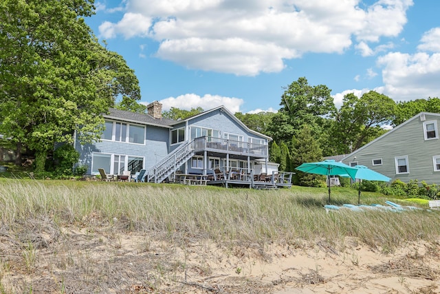 57 Oak St, Wareham, MA 02571 - back of house featuring a wooden deck, a chimney, and stairs