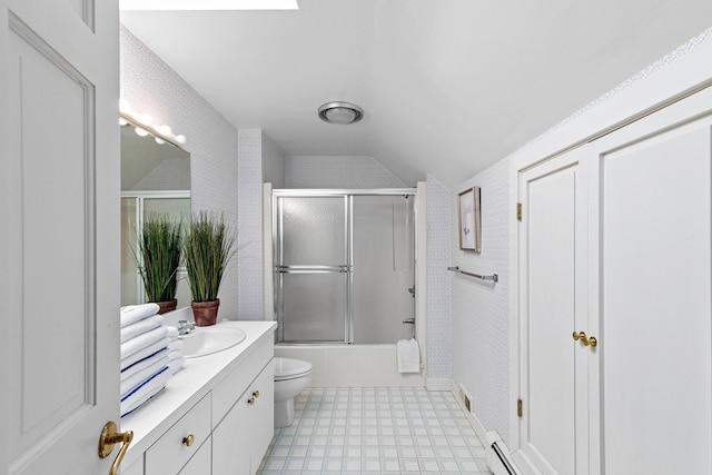 bathroom featuring lofted ceiling, enclosed tub / shower combo, toilet, tile patterned floors, and vanity