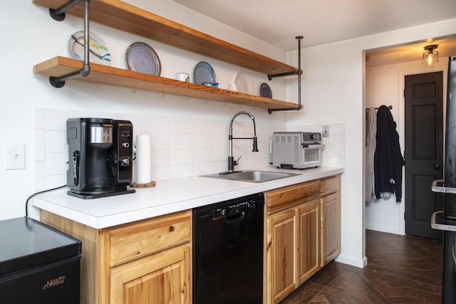 kitchen with decorative backsplash, sink, black dishwasher, and dark parquet flooring