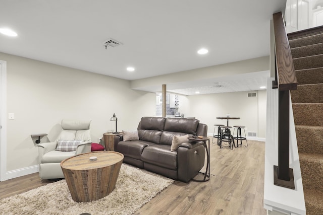 5 Lancaster Ln, Bourne, MA 02532 - living room featuring stairway, light wood finished floors, recessed lighting, and baseboards