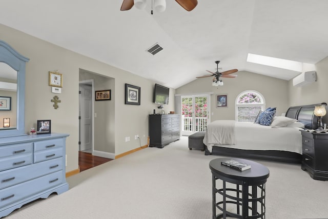 5 Lancaster Ln, Bourne, MA 02532 - bedroom with carpet, access to outside, vaulted ceiling, a skylight, and an AC wall unit