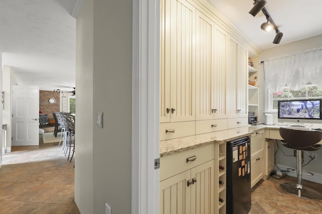 5 Lancaster Ln, Bourne, MA 02532 - office space featuring dark stone finish floors and rail lighting