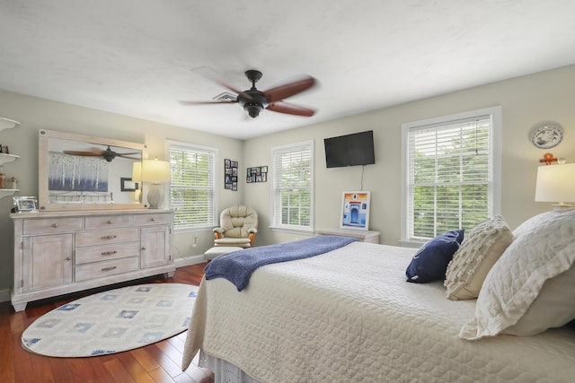 5 Lancaster Ln, Bourne, MA 02532 - bedroom with dark wood-style flooring, ceiling fan, and baseboards