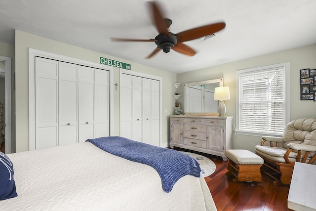 5 Lancaster Ln, Bourne, MA 02532 - bedroom with wood-type flooring, multiple closets, a ceiling fan, and baseboards