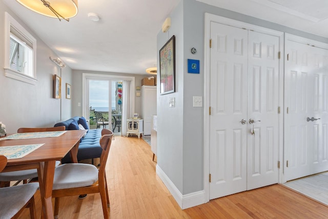544 Shore Rd Unit 9, Truro, MA 02666 - dining room with light wood-style flooring and baseboards