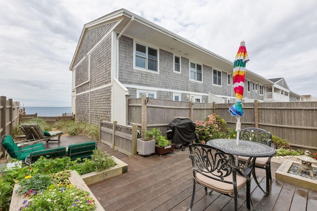 544 Shore Rd Unit 9, Truro, MA 02666 - wooden terrace featuring a fenced backyard, outdoor dining space, and grilling area