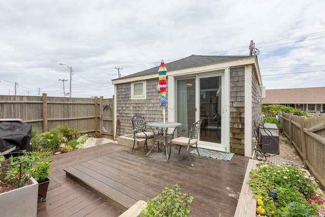 544 Shore Rd Unit 9, Truro, MA 02666 - wooden terrace with a fenced backyard and central AC