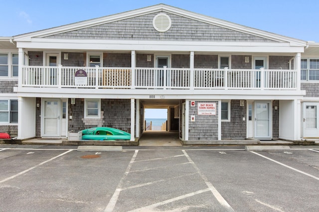 544 Shore Rd Unit 9, Truro, MA 02666 - view of building exterior featuring uncovered parking