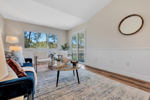 81 Fletcher Ln Unit C, Brewster, MA 02631 - living room with wood finished floors, a wainscoted wall, and baseboards