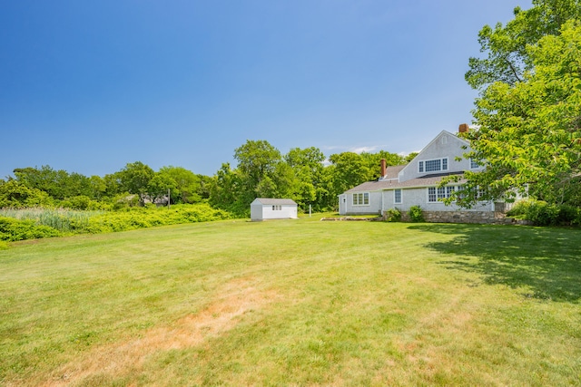 56 Wharf Ln, Yarmouth Port, MA 02675 - view of grassy yard with a shed
