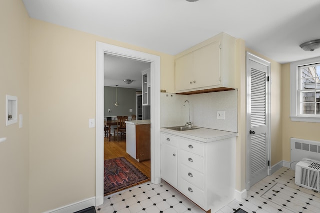 56 Wharf Ln, Yarmouth Port, MA 02675 - washroom with light flooring and radiator