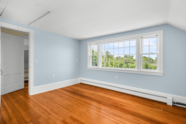 56 Wharf Ln, Yarmouth Port, MA 02675 - unfurnished bedroom featuring a baseboard radiator, wood finished floors, attic access, and lofted ceiling