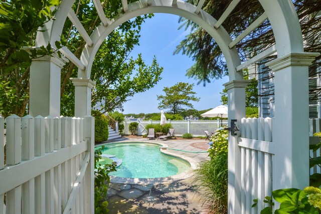 view of pool with a fenced backyard, a patio, and a fenced in pool