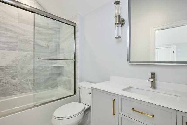 401 Main St Unit 201, West Dennis, MA 02670 - bathroom with combined bath / shower with glass door, vanity, and toilet
